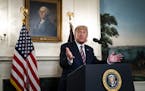 President Donald Trump gestures during an event announcing additions to his list of potential Supreme Court nominees, in the Diplomatic Room of the Wh