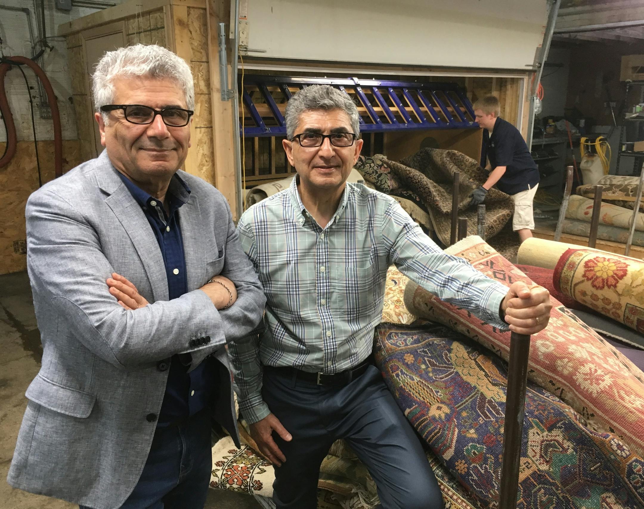 Thirty-one year owners Far and Sam Navab of Navab Brothers and its American Rug Laundry on E. Lake Street are moving the laundry business to an expanded facility in Golden Valley. The owners also have plans for the century-old building on Lake Street that will offer customer drop off and pick up, repairs, an expanded showroom . . . and eventually a coffee shop and dog bath in honor of pooches that pee on rugs. Photo: Neal.St.Anthony@startribune.com