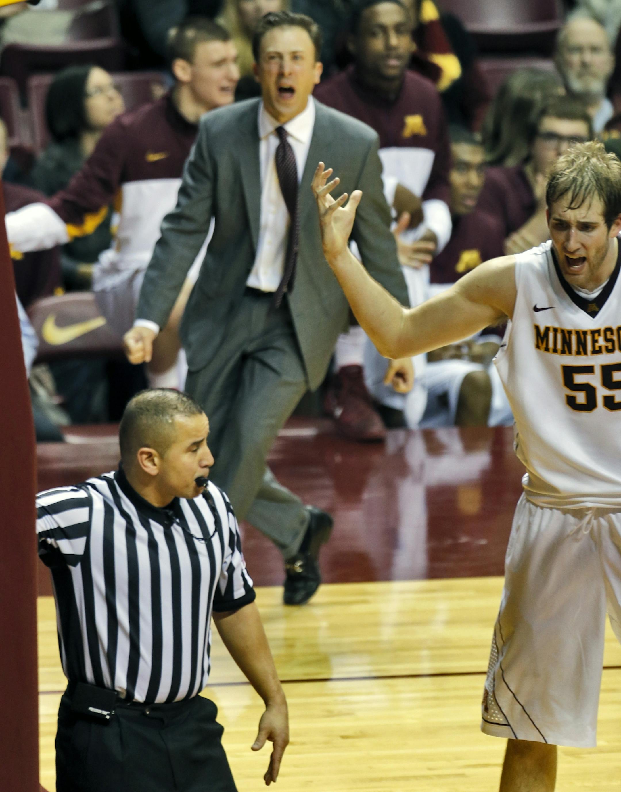 Gophers coach Richard Pitino and center Elliott Eliason objected to a no-foul call late in Minnesota's 82-79 victory over Purdue on Sunday.