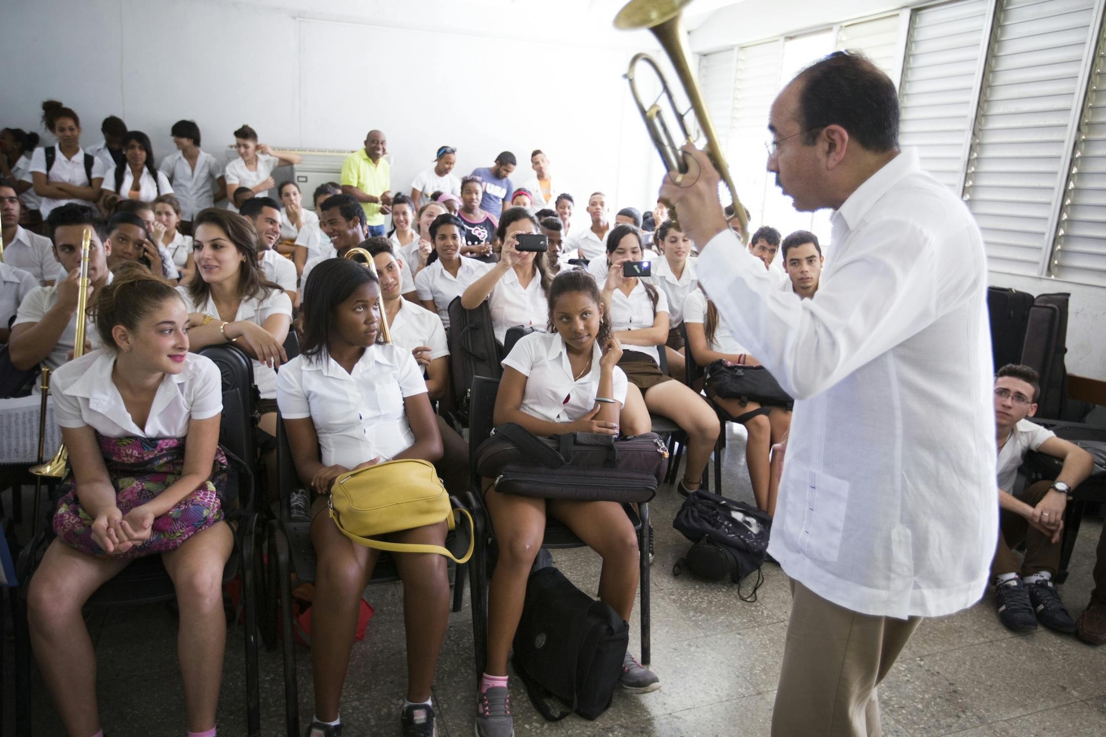 Minnesota Orchestra trumpet player Manny Laureano speaks with students at the Escuela Nacional de Musica in Havana, Cuba on Thursday, May 14, 2015.
