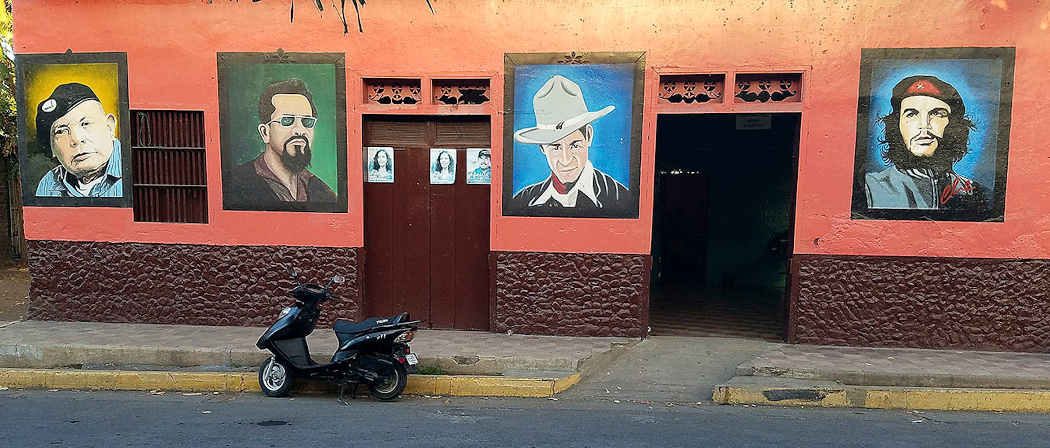 A street mural in the village of Altagracia, Ometepe, Nicaragua depicts Latin American political figures such as the revolutionary Che Guevera, right.