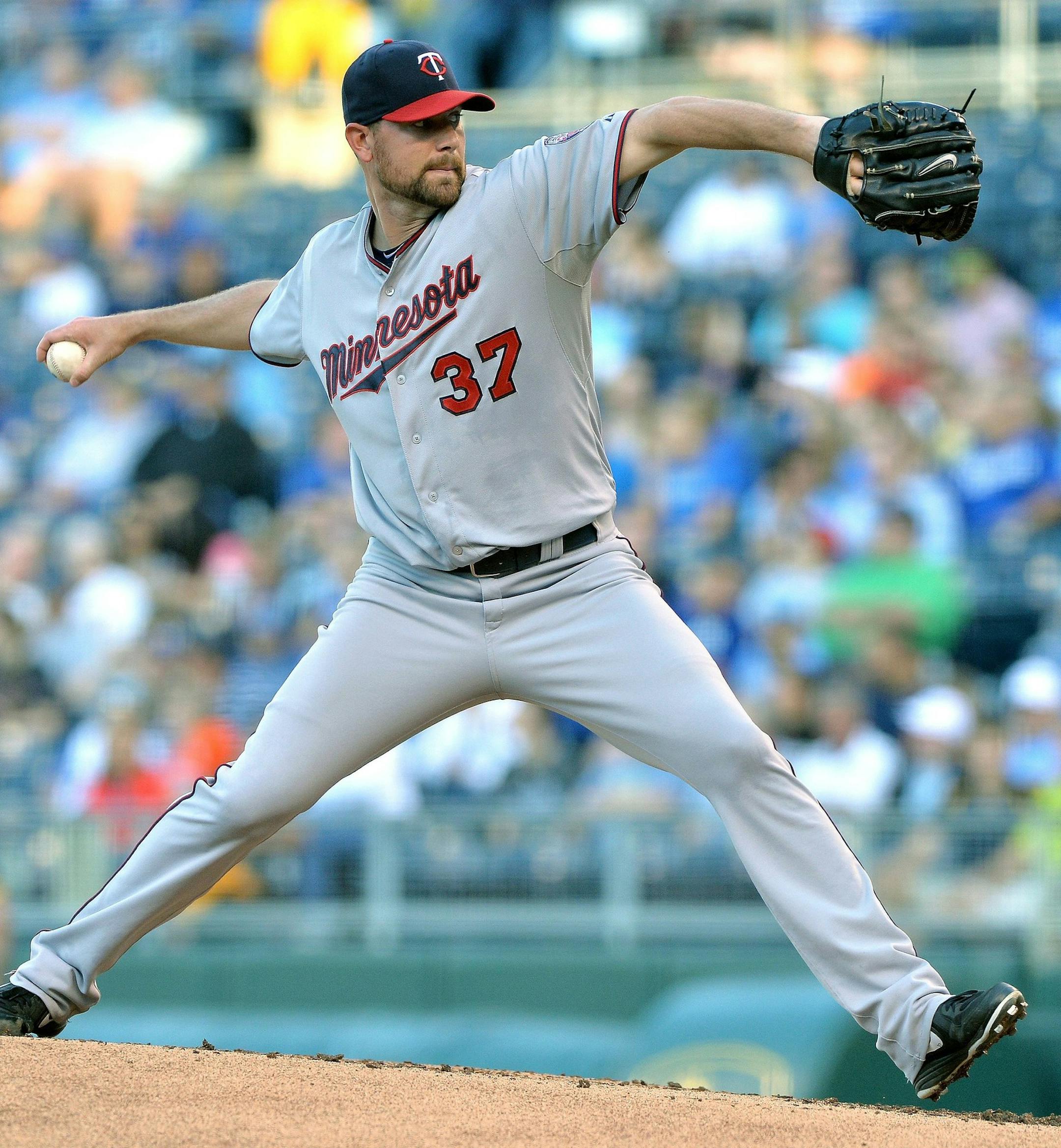 Minnesota Twins center fielder Aaron Hicks (32) throws in the first inning during Thursday's baseball game against the Kansas City Royals on June 6, 2013, at Kauffman Stadium in Kansas City, Missouri. (John Sleezer/Kansas City Star/MCT)