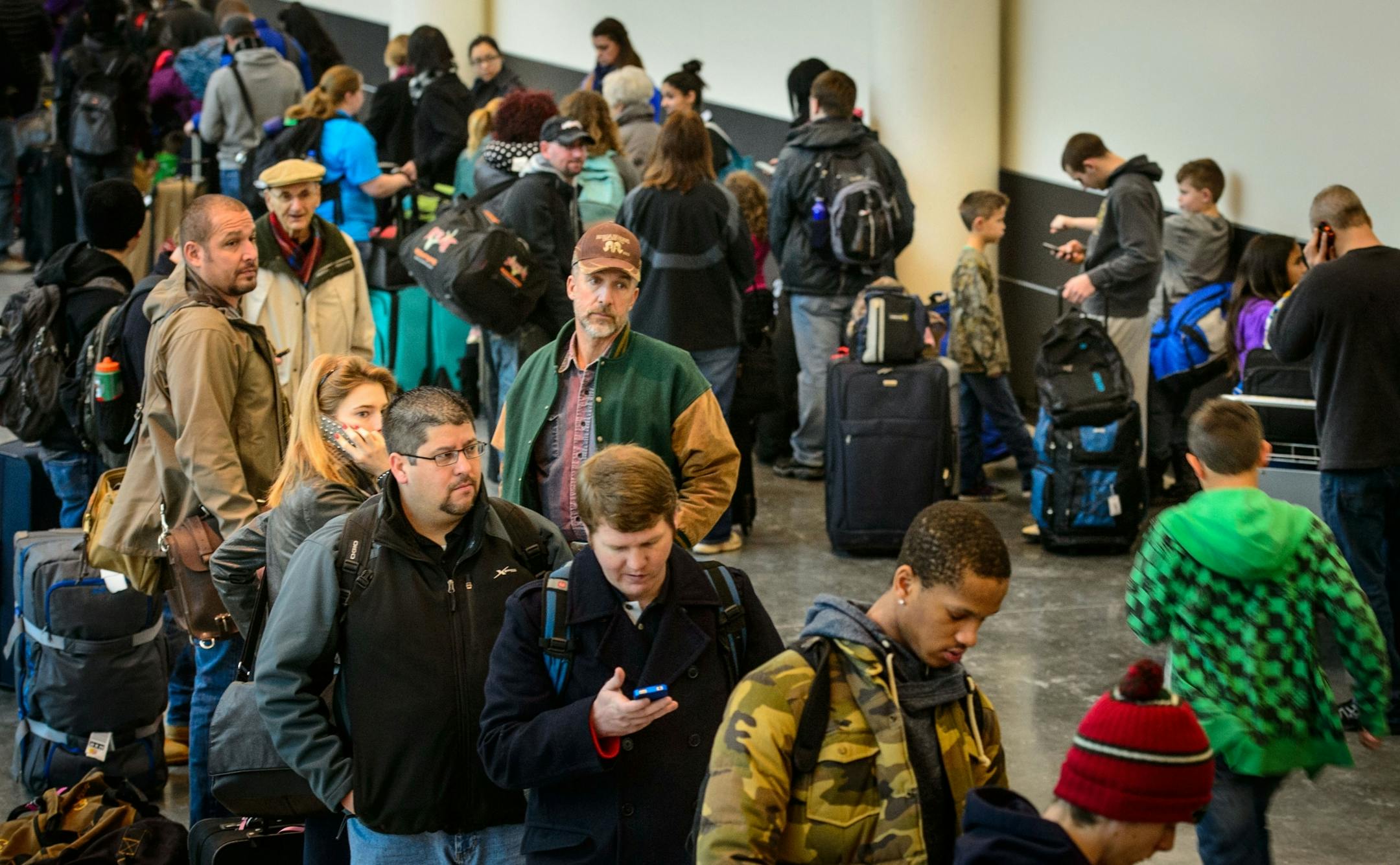 Long lines remained mid-morning on Friday for Southwest Airlines passengers at Terminal 2 at the Minneapolis-St. Paul International Airport. A suspicious package prompted an evacuation shortly after 6 a.m., delaying flights.
