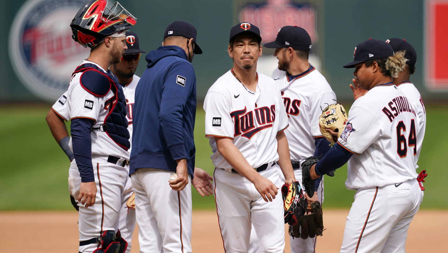 Minnesota Twins starting pitcher Kenta Maeda (18) reacted as he was pulled from the game by Twins manager Rocco Baldelli (5) in the fifth inning. ] ANTHONY SOUFFLE • anthony.souffle@startribune.com