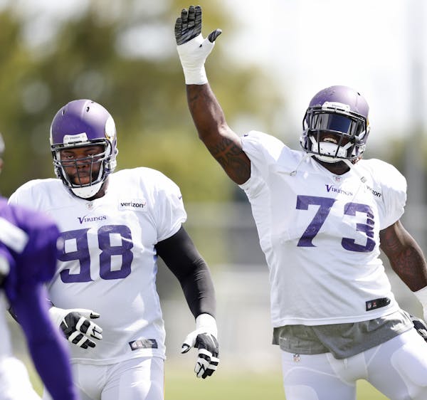 Tackles Linval Joseph (98), and Sharrif Floyd warmed up during practice Friday August 5, 2016 in Mankato, MN.] The Minnesota Vikings held practice at 
