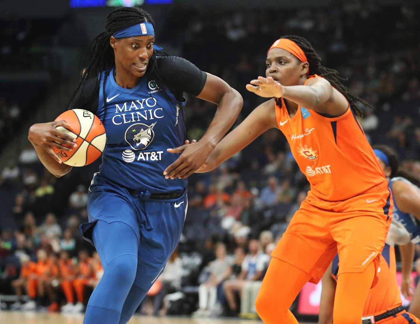 The Minnesota Lynx's Sylvia Fowles (34) drives on the Connecticut Sun's Jonquel Jones (35) during the first half Friday, Aug. 9, 2019, at Target Center in Minneapolis, MN The Lynx beat the Sun 89-57.]