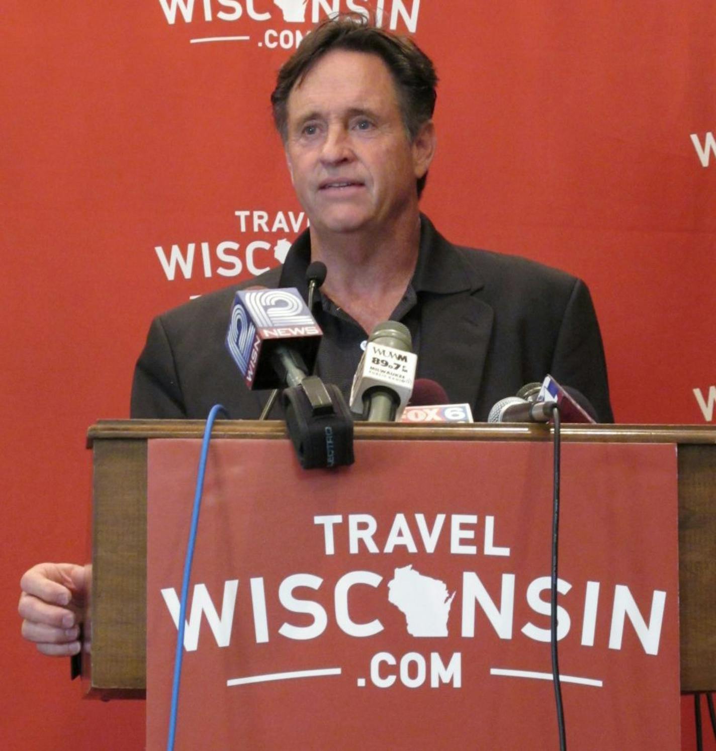 Actor Robert Hays speaks at a press conference in Milwaukee on Monday, June, 25, 2012. Hays is starring in a new summer tourism commercial for the state, which is being directed by David Zucker. Zucker last directed Hays in the 1980 movie "Airplane!"