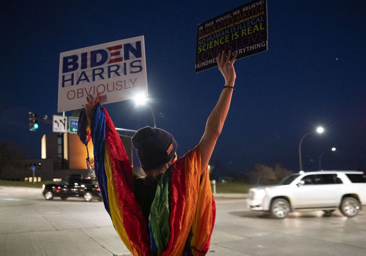 Allisun Zagar joined around thirty-five Biden supporters as they gathered at the intersection of Central Entrance and Mesaba Ave. in Duluth, Minn., on Tuesday, Nov. 3, 2020.