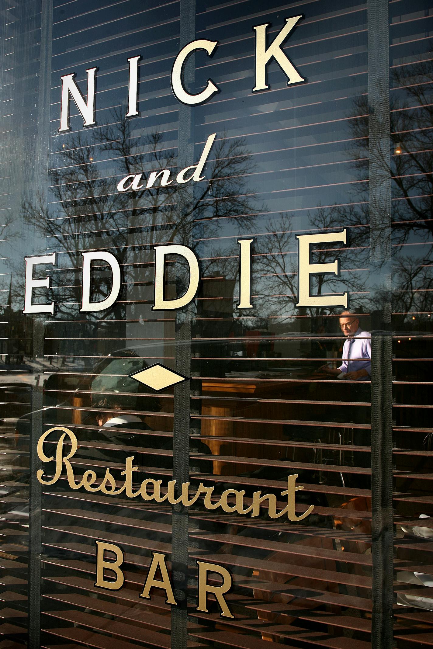 "Nick and Eddie", 1612 Harmon Place. Chef Steve Vranian and pastry chef Jessica Anderson are the focus of the new place on Loring Park. The gold lettering on the store front window gives it an old time feeling.