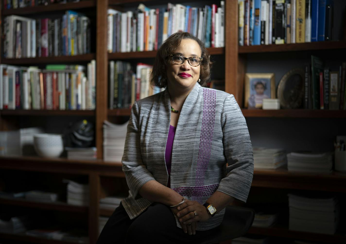 Macalester College Prof. Duchess Harris, shown at her Vadnais Heights home, is working on books for grades three to six that look at moments and figures in black history.