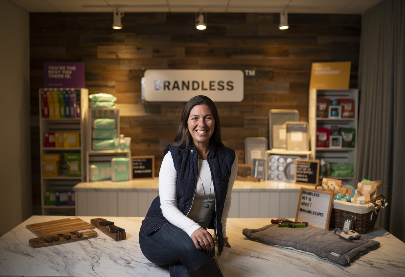 Rachael Vegas, chief merchant of Brandless, was photographed Tuesday afternoon with some of the new product lines launching this week. ] JEFF WHEELER &#x2022; jeff.wheeler@startribune.com Brandless.com is a fast growing e-commerce startup headquartered in San Francisco and Minneapolis and is making its biggest announcement in its 2-year history Wednesday. The company sells food and household goods -- all for $3 -- and is launching baby and pet products Wednesday. The company is trying to remove