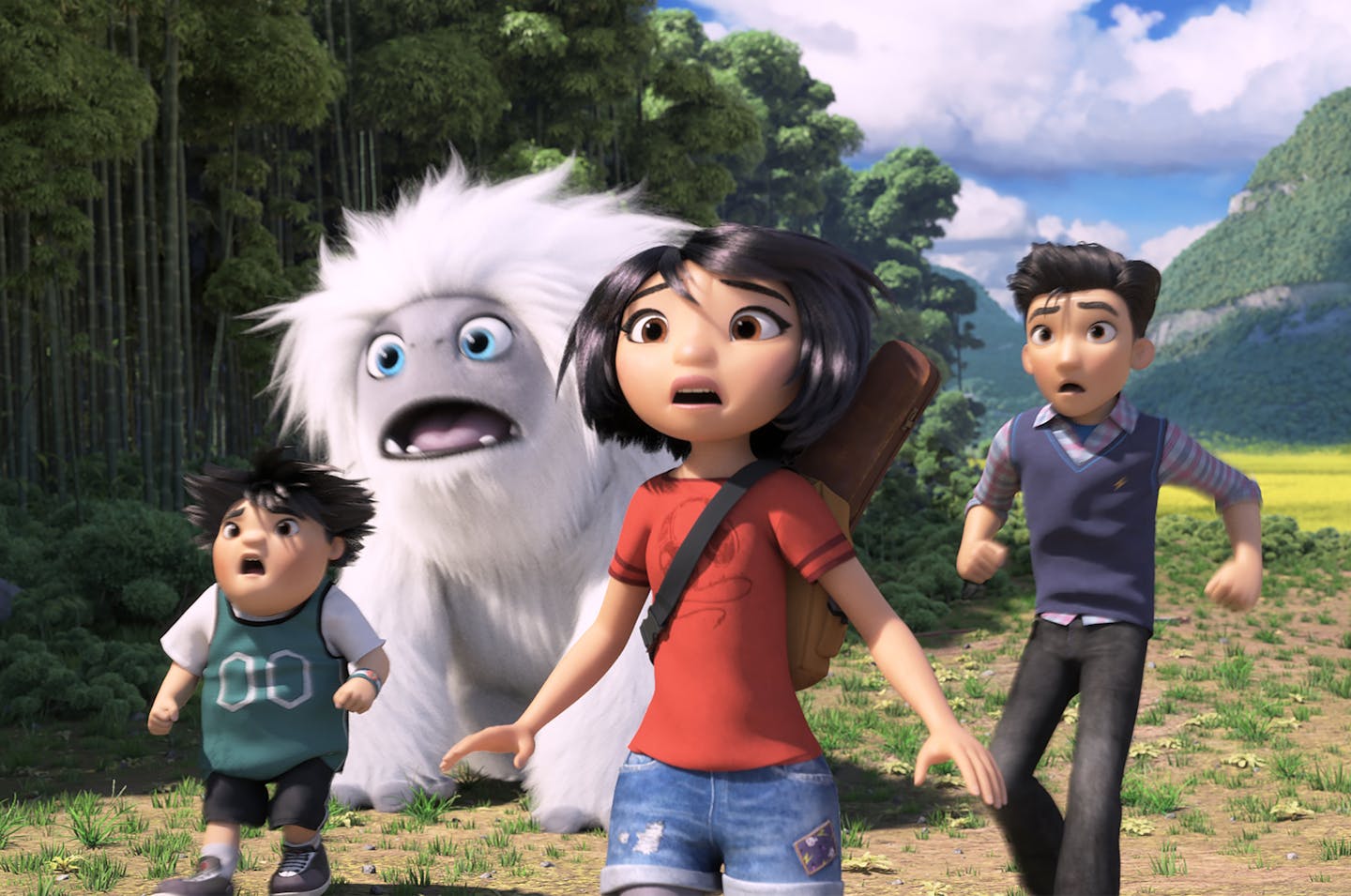 This image released by DreamWorks Animation shows characters, from left, Peng, voiced by Albert Tsai, Everest the Yeti, Yi, voiced by Chloe Bennet and Jin, voiced by Tenzing Norgay Trainor, in a scene from "Abominable," in theaters on Sept. 27. (DreamWorks Animation LLC. via AP)