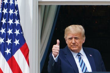 President Donald Trump greets supporters at the White House in Washington, DC, on October 10, 2020.