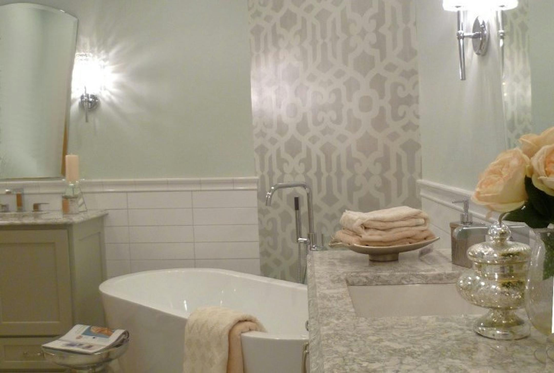 Layers of lighting and soothing colors helped transform a dated master bath.