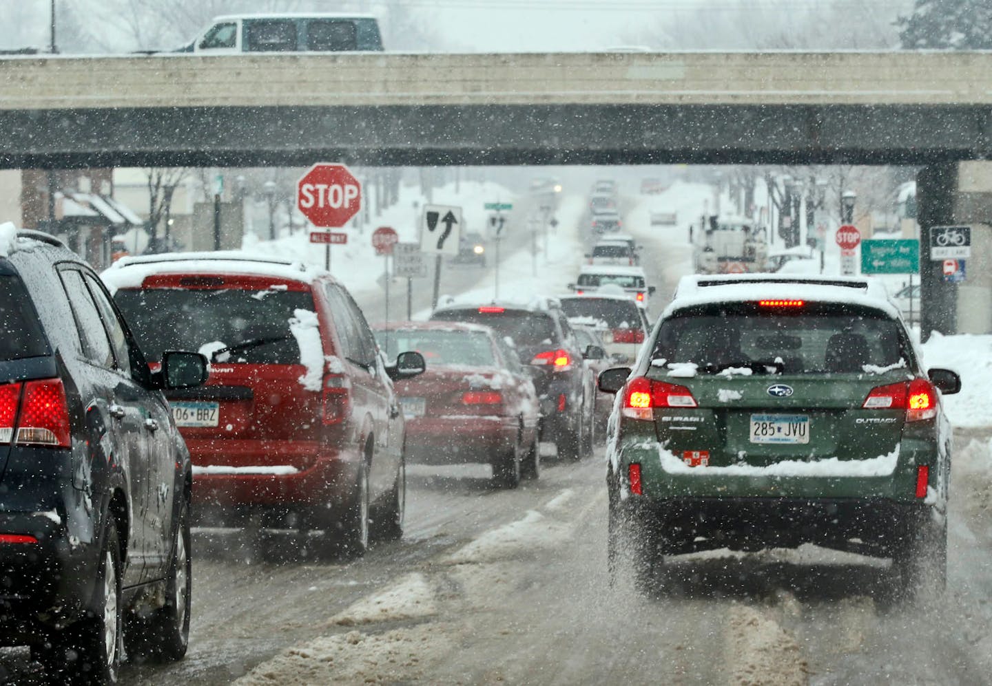 After a snowstorm in metro area, traffic was jammed up on Como Ave. in St. Paul in February 2014.