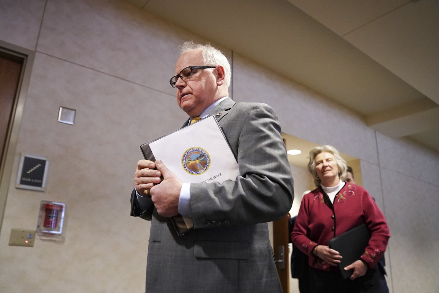 Minnesota Gov. Tim Walz and his administration are pushing insurers to cover more costs to treat COVID-19. (Glen Stubbe/Star Tribune)