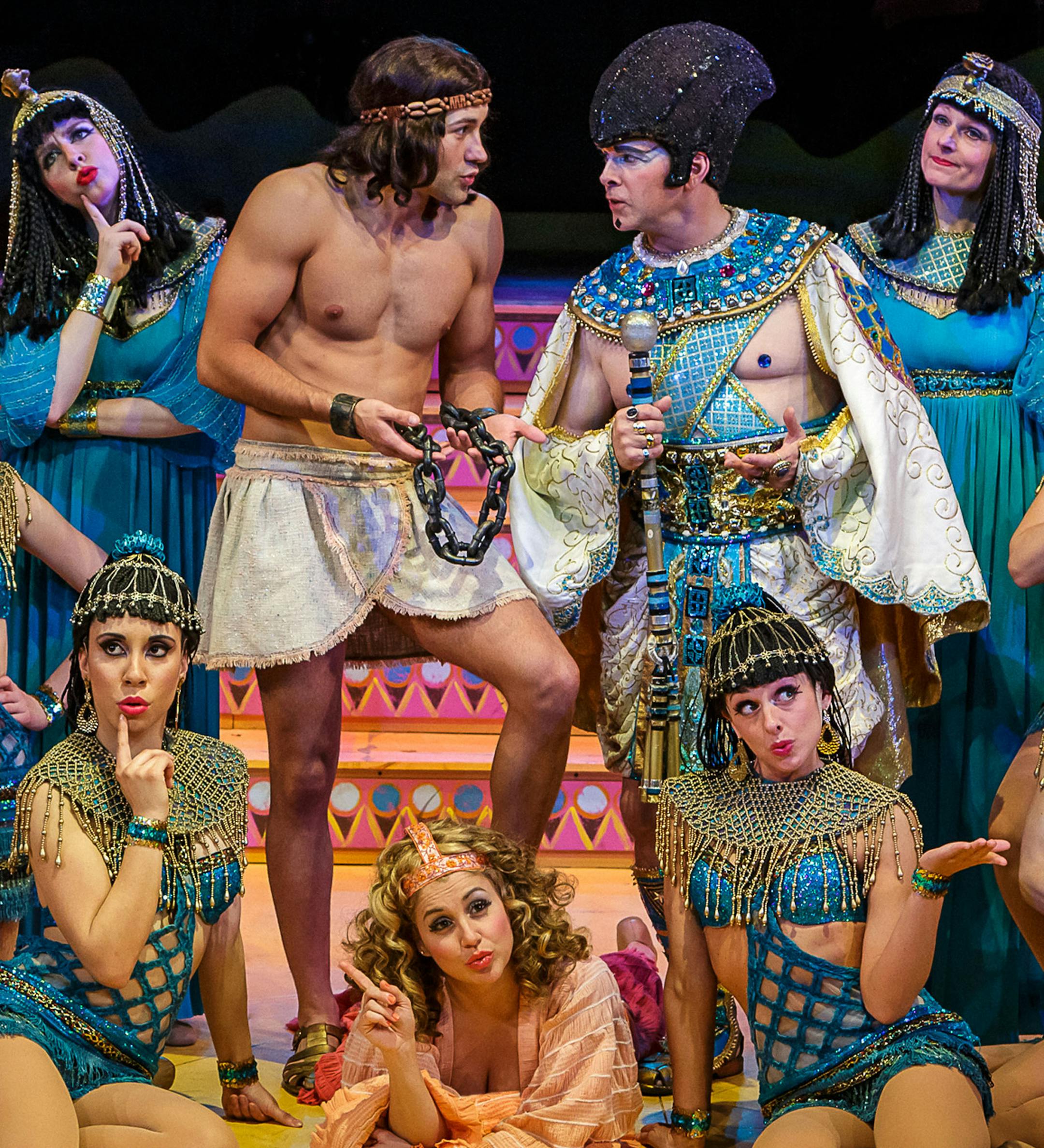 Jared Oxborough as Joseph, Keith Rice as Pharaoh and Jodi carmeli, bottom, as Narrator in "Joseph and the Amazing Technicolor Dreamcoat" at Chanhassen Dinner Theatres.
