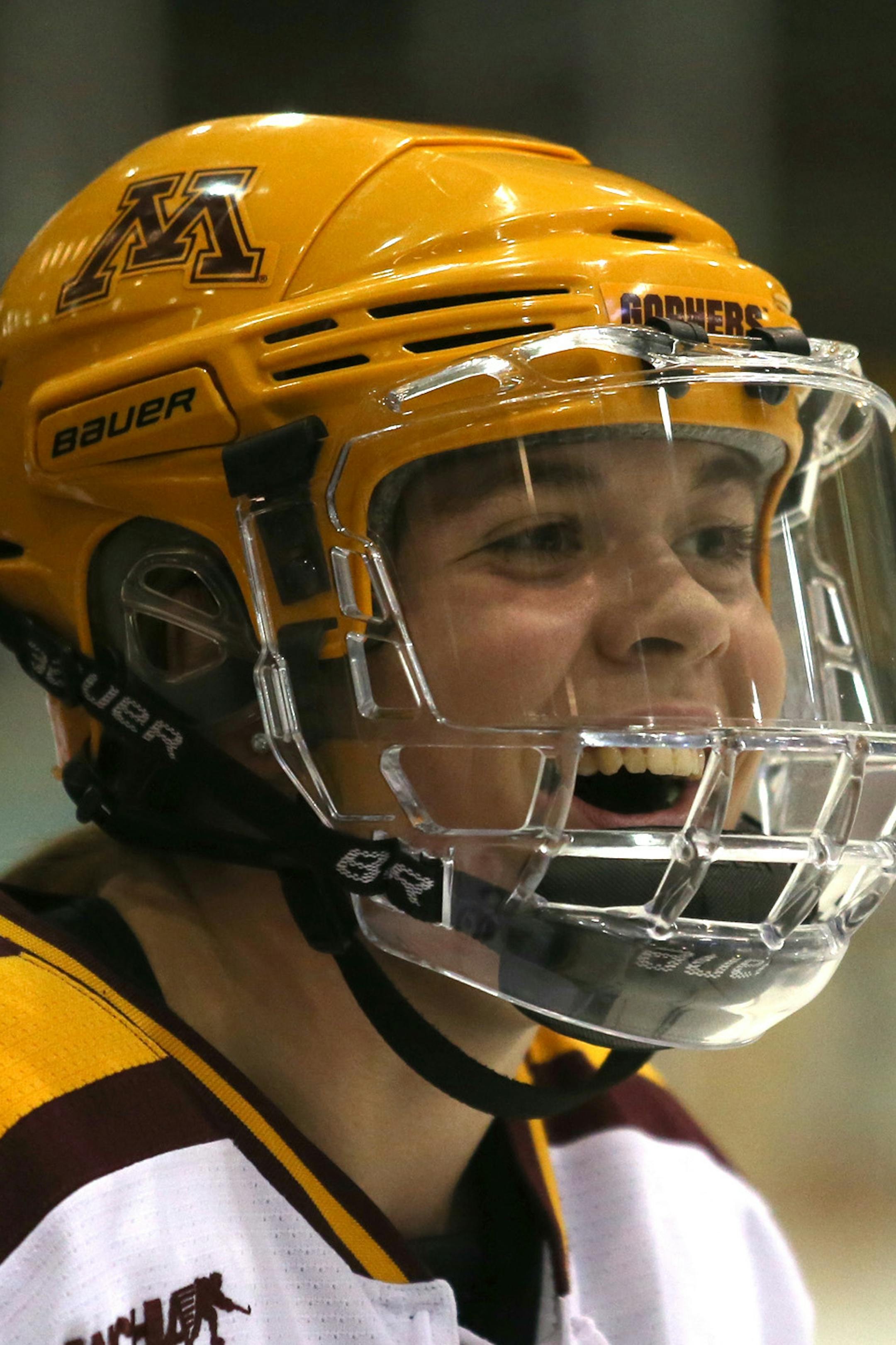 Gopher Hannah Brandt smiling before the game as she talked to teammates ] (KYNDELL HARKNESS/STAR TRIBUNE) kyndell.harkness@startribune.com Gopher women's hockey played Boston University in the quarterfinals of the NCAA championship at Ridder Arena in Minneapolis, Min, Saturday March 15, 2014. Gophers won over Boston University 5-1.