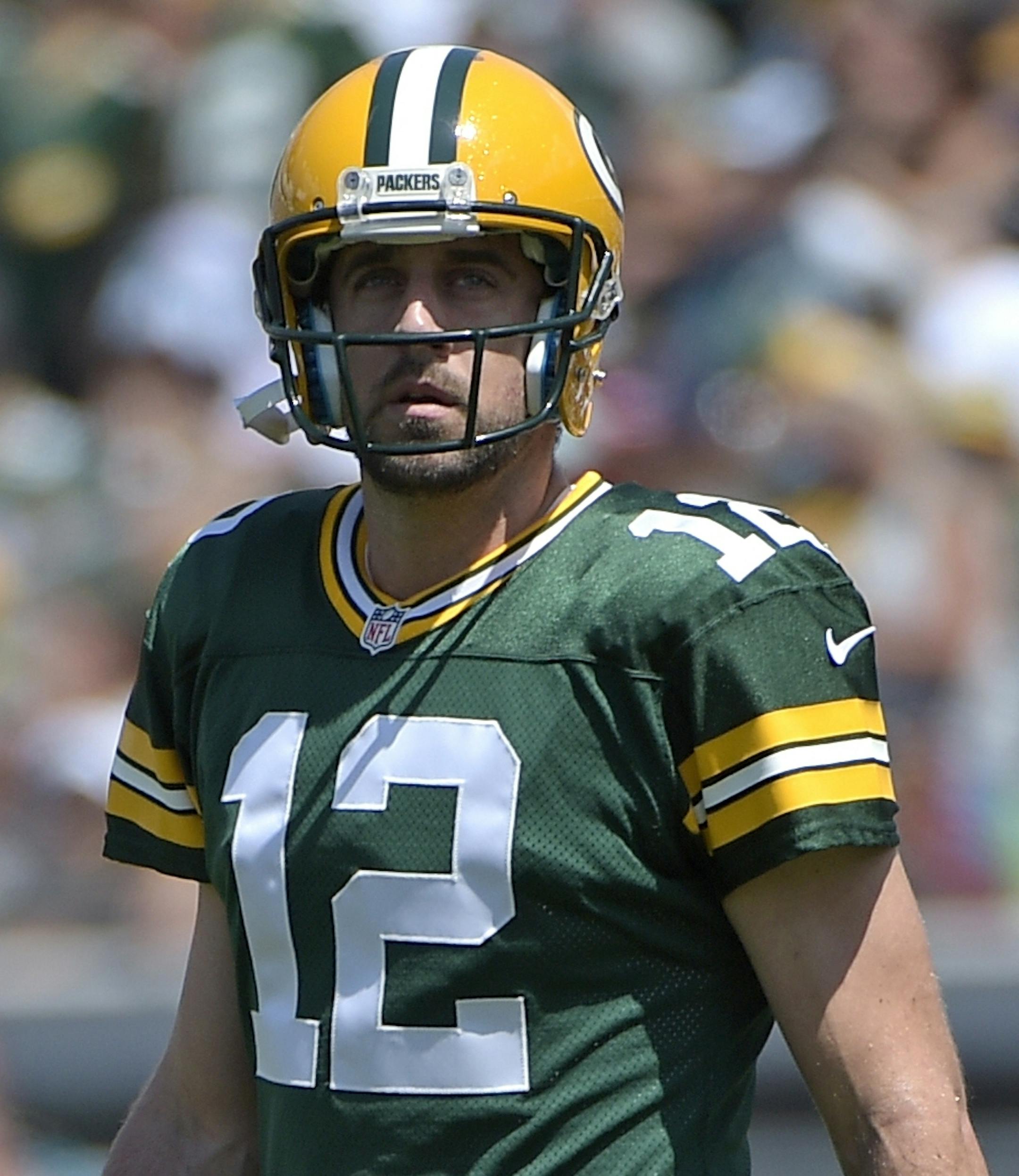 Green Bay Packers quarterback Aaron Rodgers (12) walks onto the field during the first half of an NFL football game against the Jacksonville Jaguars in Jacksonville, Fla., Sunday, Sept. 11, 2016. (AP Photo/Phelan M. Ebenhack)