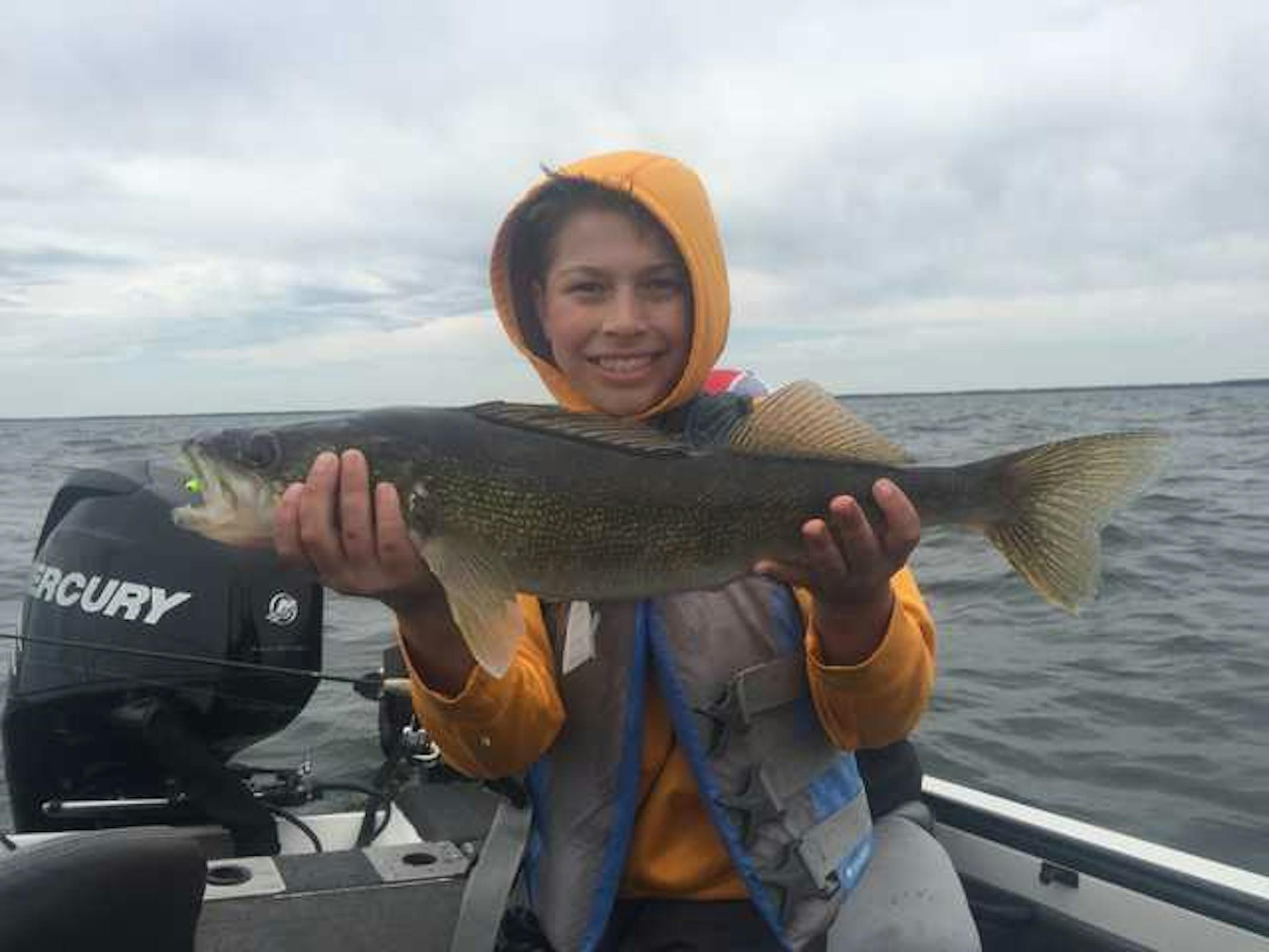 Here's how to properly hold a big fish, as shown by Leo Christenson, 12, of Savage.
