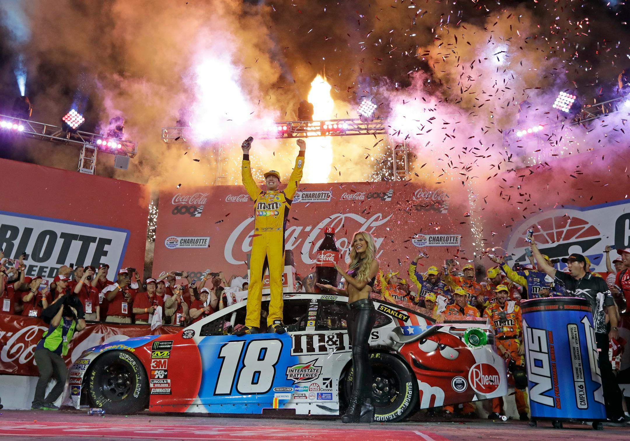 Kyle Busch celebrated after winning the Coca-Cola 600 at Charlotte Motor Speedway in 2018.