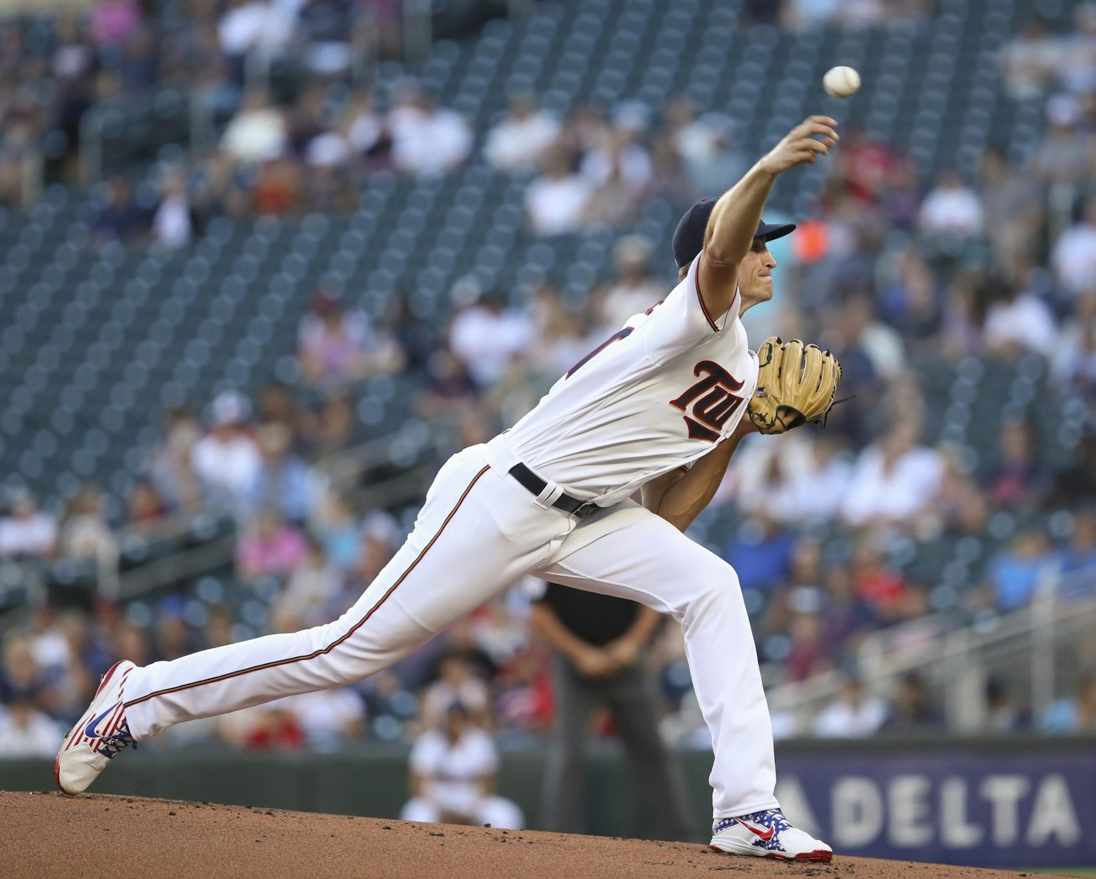 Minnesota Twins starting pitcher Aaron Slegers throwing against Baltimore in the first inning.
