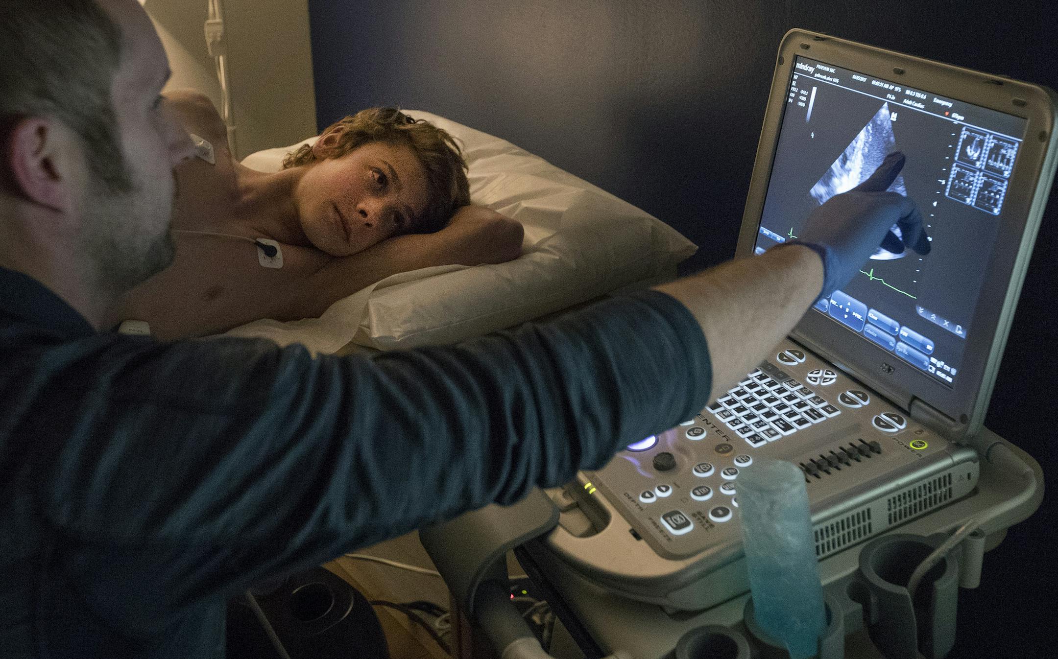 Sonographer Alex Budd checked Alex Galbreth, 15, at PRAVENI in Eden Prairie. ] CARLOS GONZALEZ &#xef; cgonzalez@startribune.com - April 5, 2017, Eden Prairie, MN, PRAVENI youth heart screening,