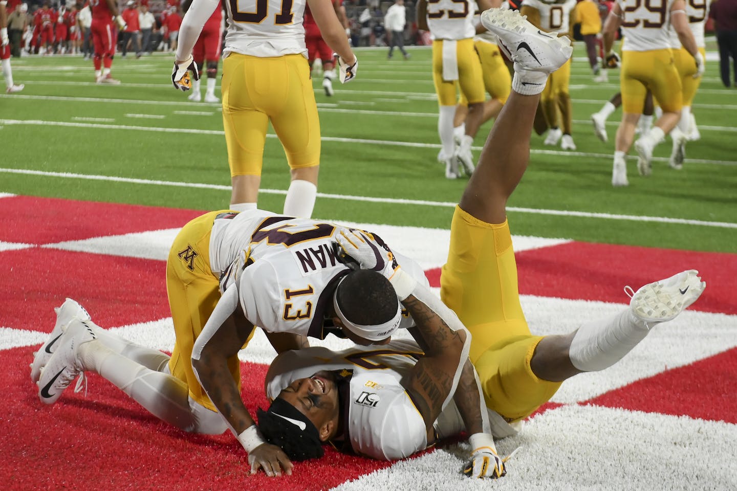 Gophers wide receiver Rashod Bateman (13) and wide receiver Chris Autman-Bell (7) celebrated after their overtime victory over Fresno State Bulldogs Saturday night. Autman-Bell scored the game tying touchdown to force overtime. ] Aaron Lavinsky &#x2022; aaron.lavinsky@startribune.com The Minnesota Gophers played the Fresno State Bulldogs on Saturday, Sept. 7, 2019 at Bulldog Stadium in Fresno, Calif.