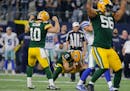 Kicker Mason Crosby (2) kicked the game-winning 51-yard field goal with three seconds left as the Packers beat the Cowboys 34-31 in an NFL Divisional 