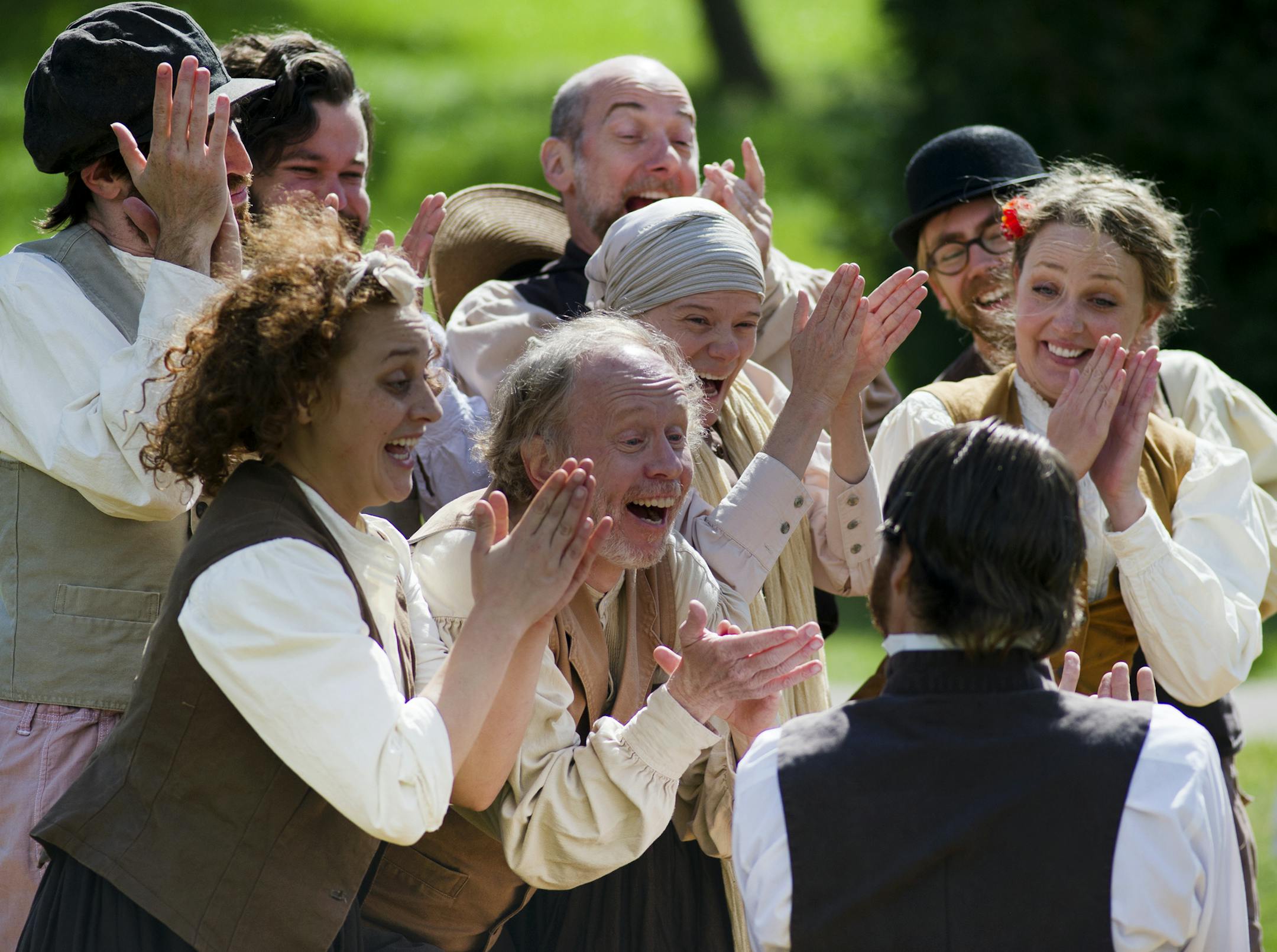 The cast of "Nature", a walking play being performed at the Minnesota Landscape Arboretum, performs an energetic scene Saturday afternoon. ] (Matthew Hintz, 091314, Chanhassen)