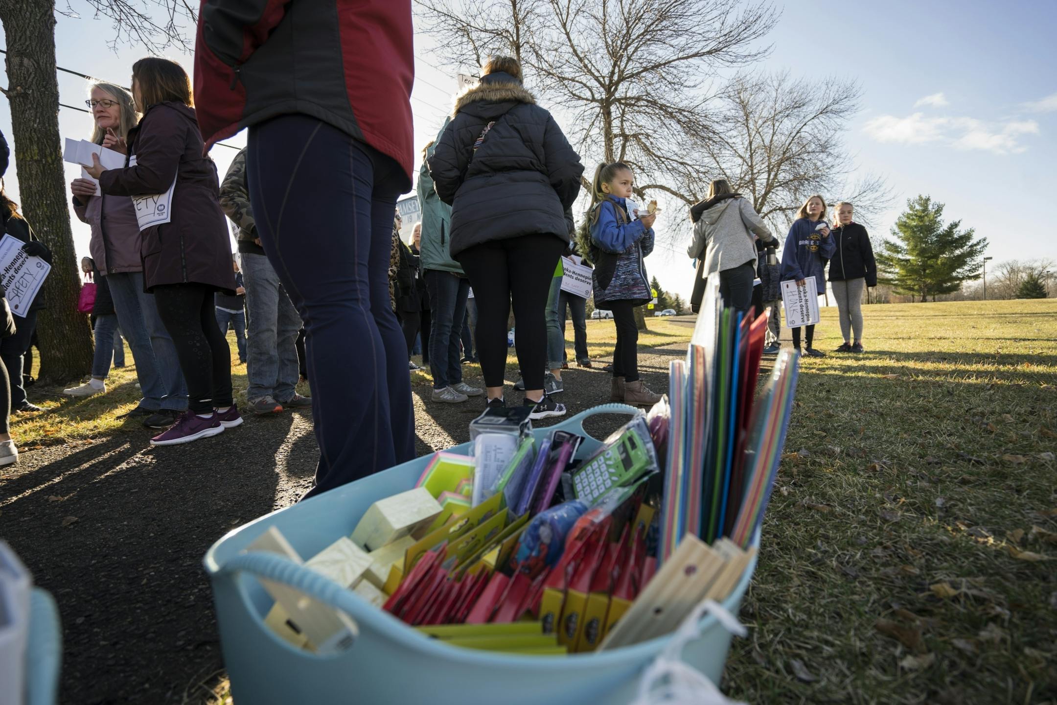 School supplies were put in a bin during a walk in on Thursday, April 18, 2018 outside of Ramsey Elementary School in Ramsey, Minn.