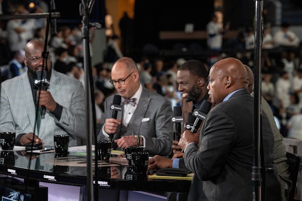 From left, TNT's crew of Shaquille O’Neal, Ernie Johnson, Draymond Green, Kenny Smith and Charles Barkley chop it up during Game 1 at Target Center.