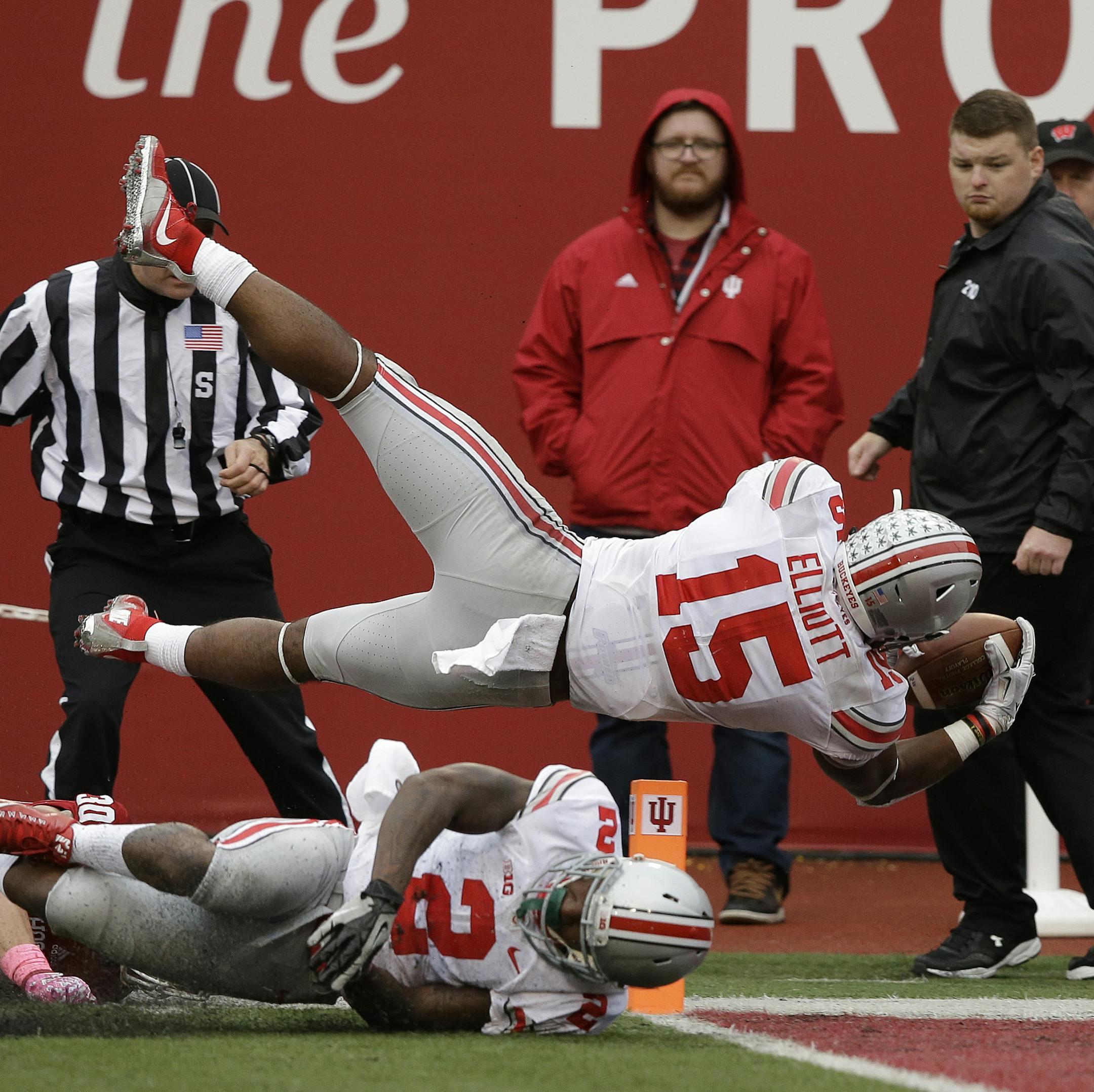 Ohio State's Ezekiel Elliott (15) dives into the end zone for a 55 yard touchdown run during the second half of an NCAA college football game against Indiana, Saturday, Oct. 3, 2015 in Bloomington, Ind. (AP Photo/Darron Cummings)