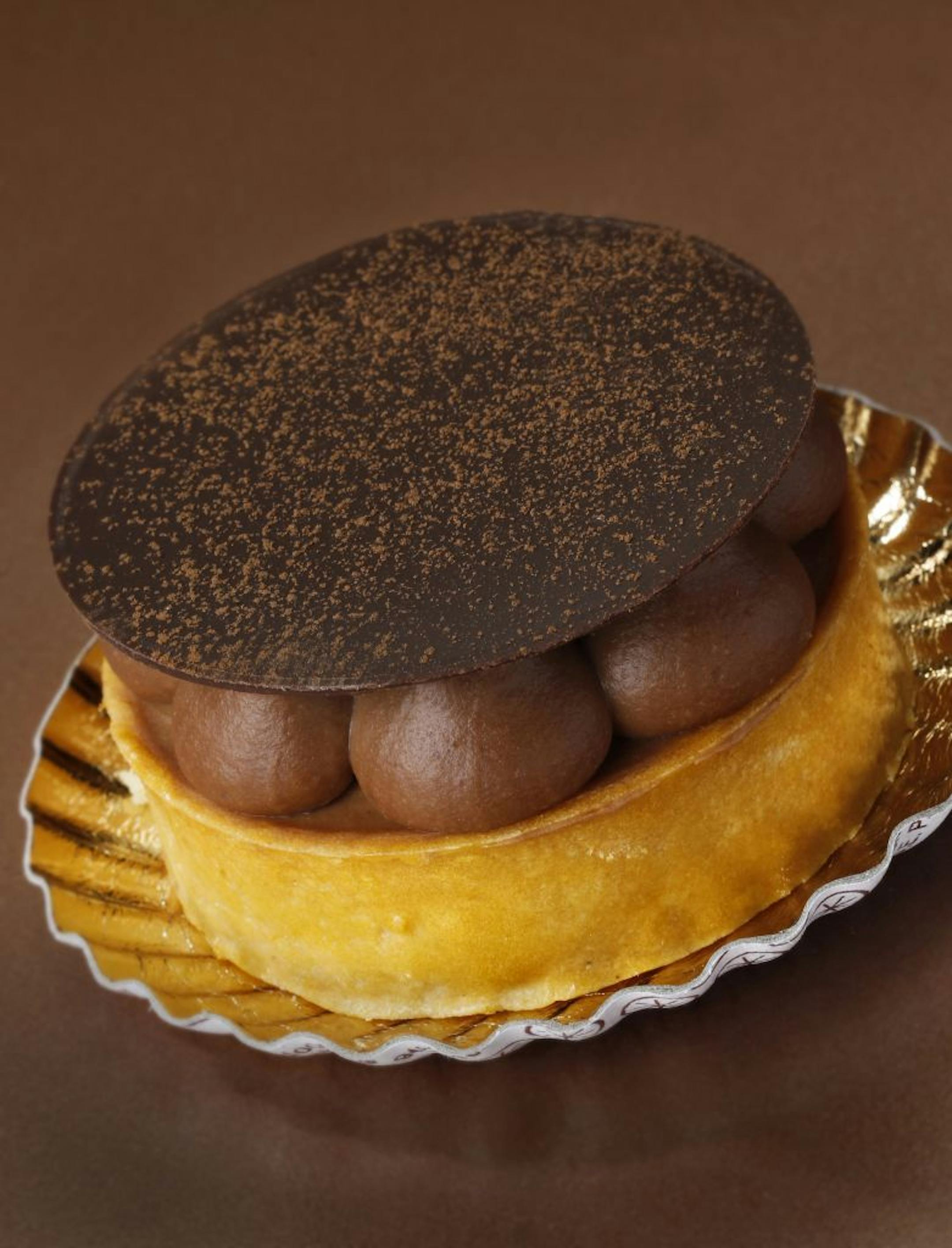 A "Great Chefs" profile of Patisserie 46 chef/owner John Kraus. The bakery restaurant is on the corner of 46th and Grand in South Minneapolis _ Chocolate mouse cake, Tristan. [ TOM WALLACE � twallace@startribune.com _ Assignments #20026490A_ Dec 1, 2012_ SLUG: chef1213_ EXTRA INFORMATION: Signature sweet, from the Minneapolis, French bakery, Patisserie 46, The staff; Owner/artisian baker, John Kraus, Wife, Dawn Kraus, Jason Curry, Ashley Johnson, Marc Levy, Lara Kuratko , Leah Titus, Matthew Moo