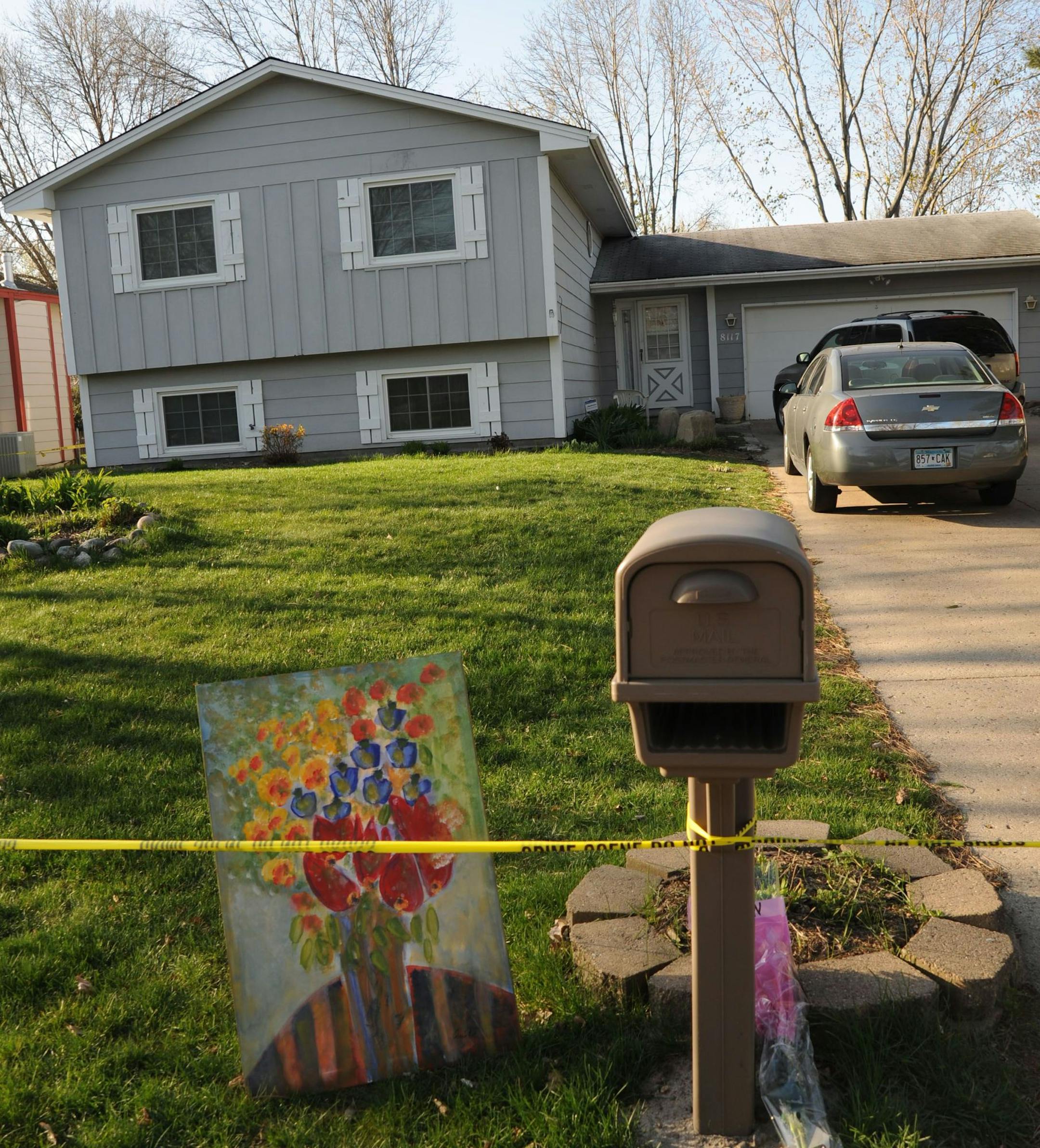 Police tape surrounded Brown’s home in Brooklyn Park the day after the shootings.