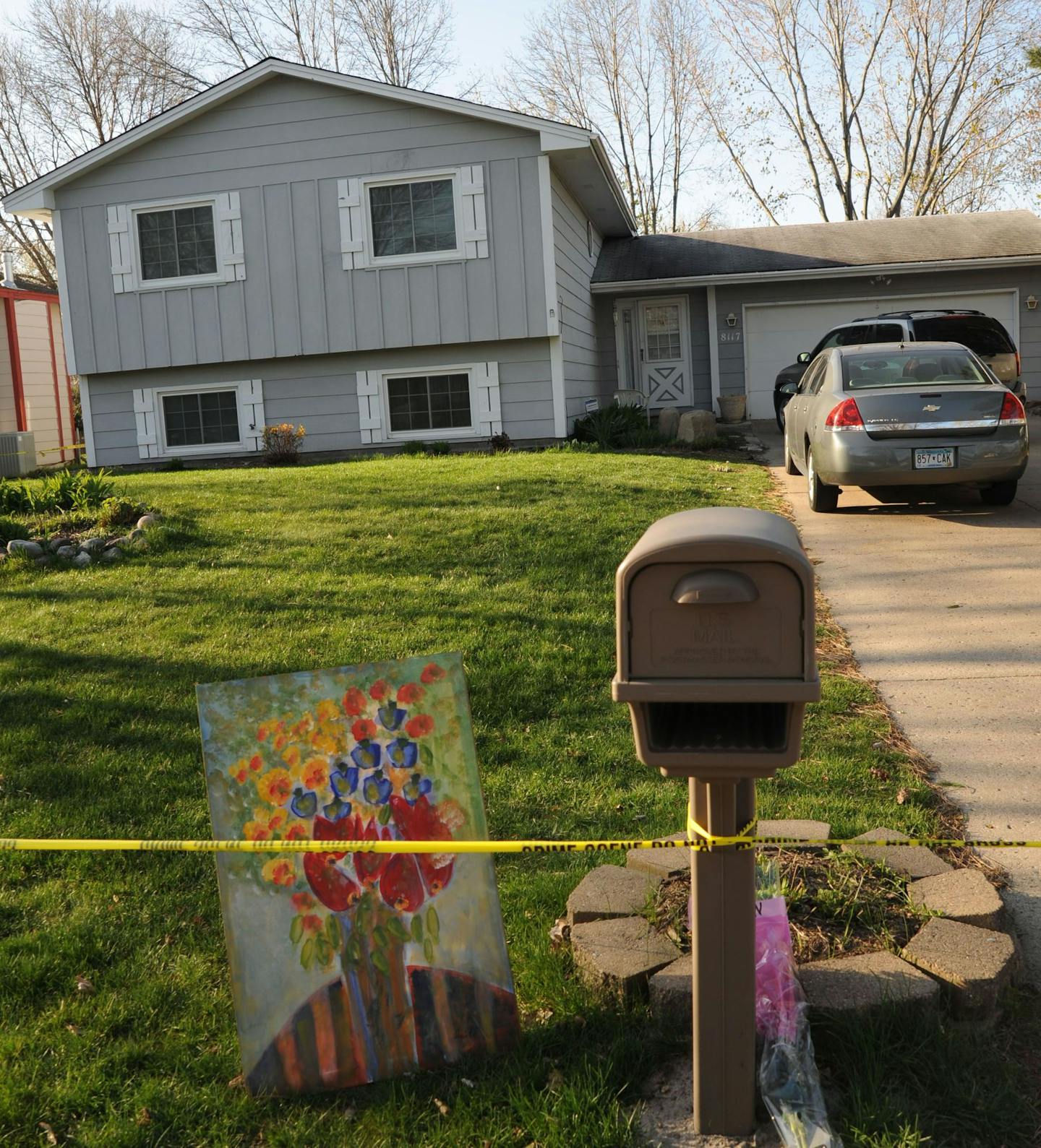 Police tape surrounded Brown&#x2019;s home in Brooklyn Park the day after the shootings.