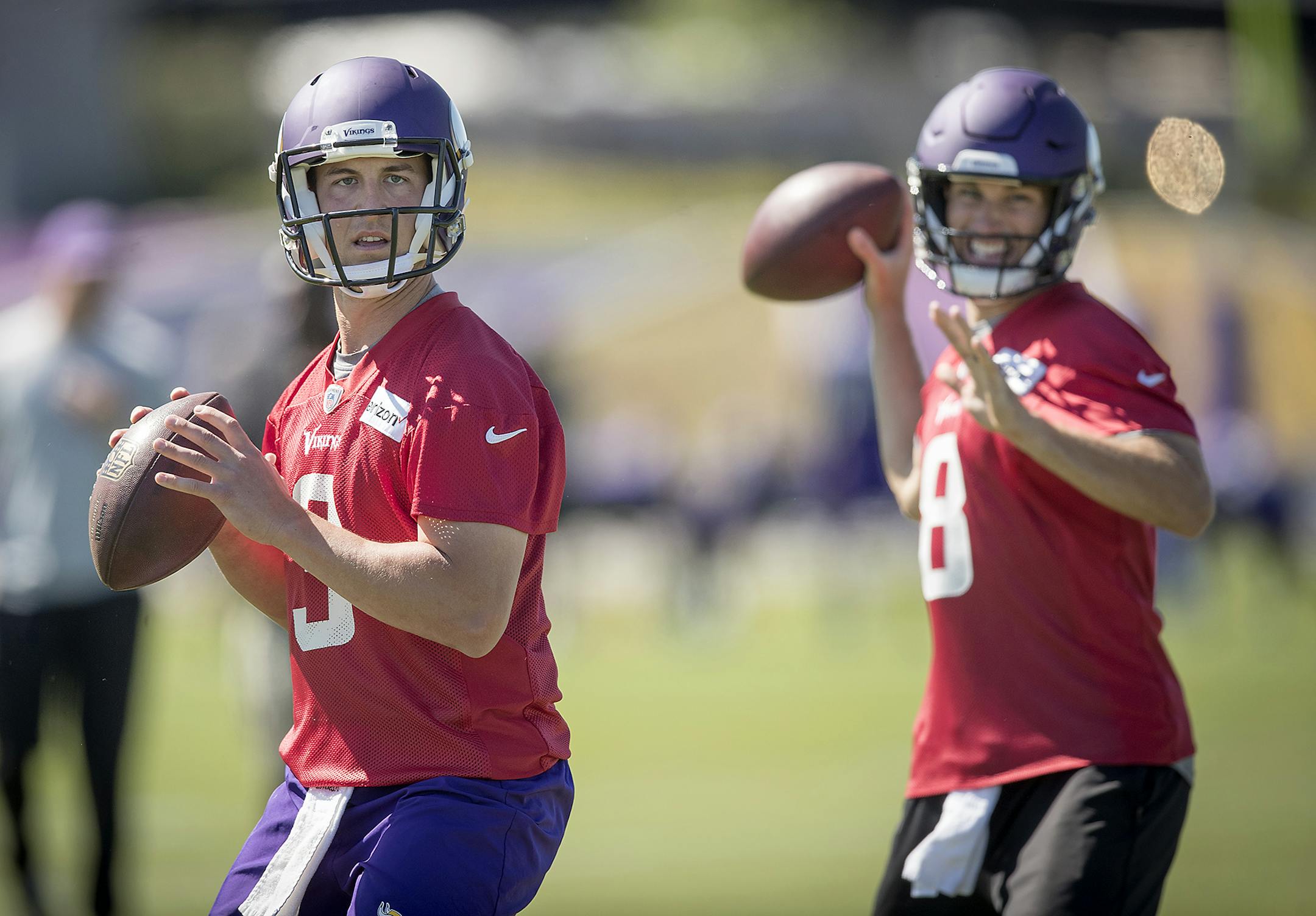 Vikings quarterback Trevor Siemian, left, ran drills alongside quarterback Kirk Cousins during a mandatory Vikings three-day minicamp at the TCO Performance Center, June 13, 2018 in Eagan, MN. ] ELIZABETH FLORES &#xef; liz.flores@startribune.com