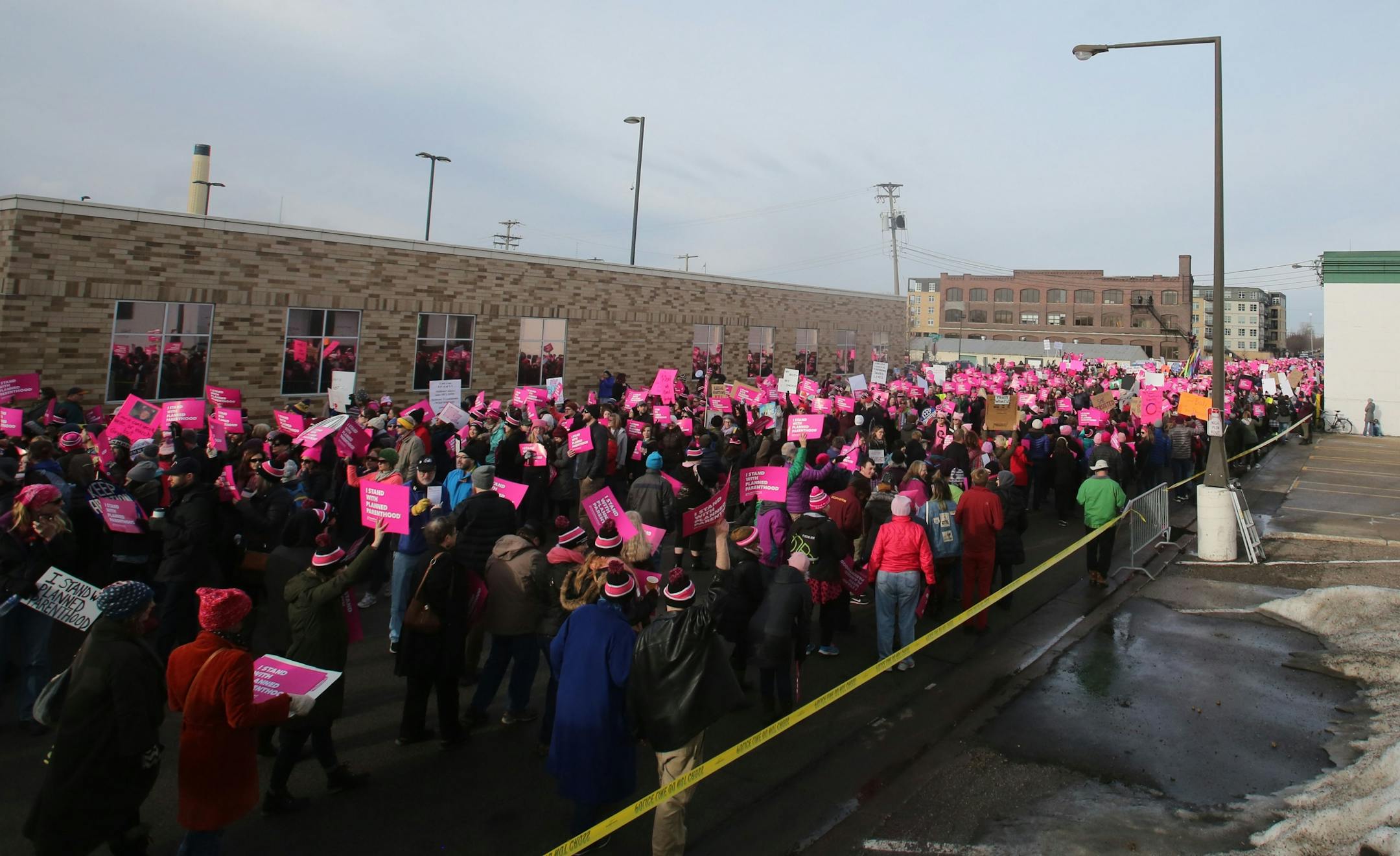 Defend Planned Parenthood and Pro-Life Action Ministries had dueling protests Saturday, Feb. 11, 2017, at the Planned Parenthood center in St. Paul, MN. Here, a large contingent of Defend Planned Parenthood supporters marched.