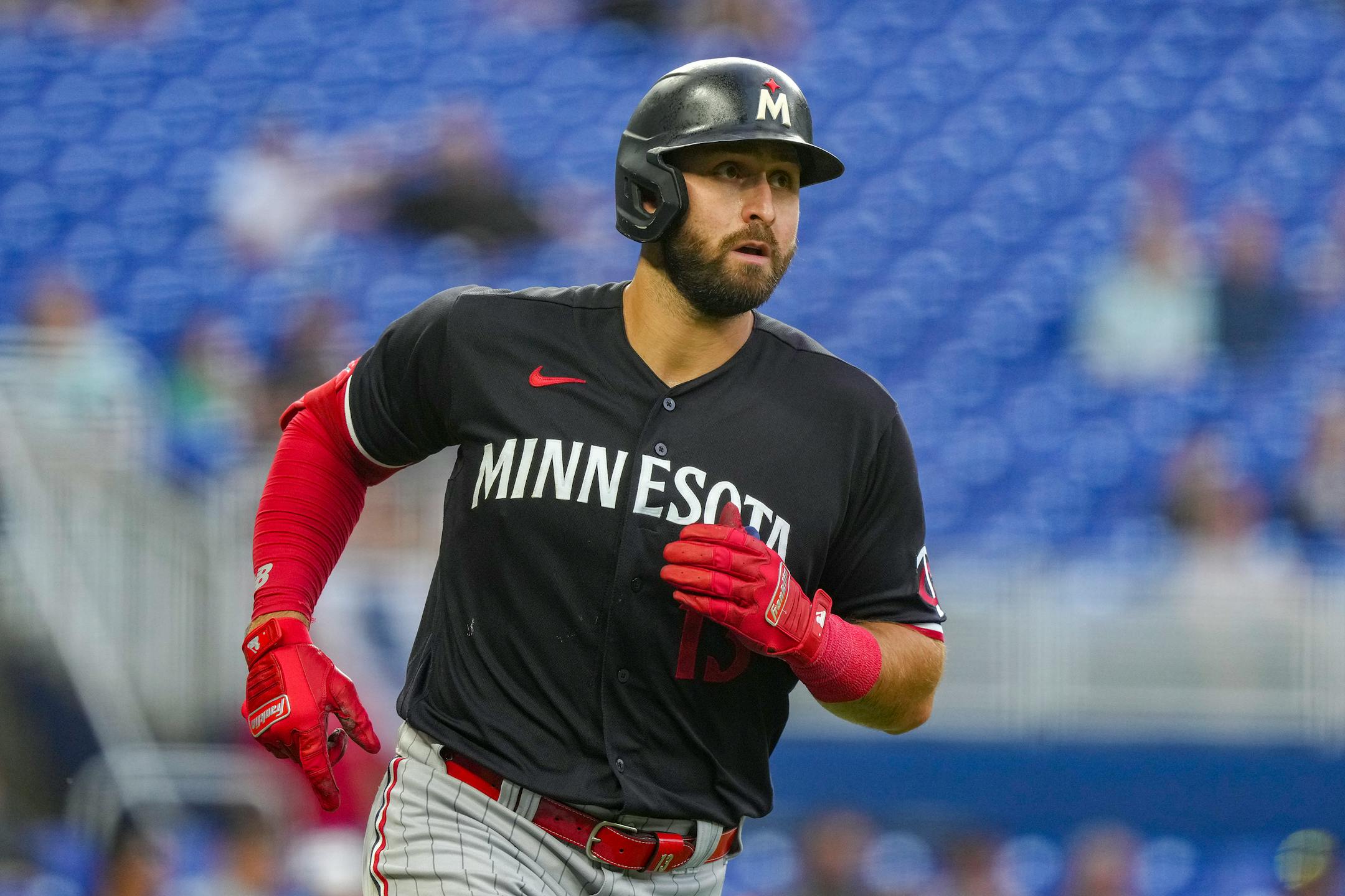 Joey Gallo (13) of the Minnesota Twins hits a home run in the second inning against the Miami Marlins at loanDepot park on Monday, April 3, 2023, in Miami. (Eric Espada/Getty Images/TNS) ORG XMIT: 75886105W