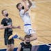 Hayfield's Ethan Slaathaug went up for two during the first half of the game, Wednesday, April 7, 2021 at the Target Center in Minneapolis, MN. ] ELIZ