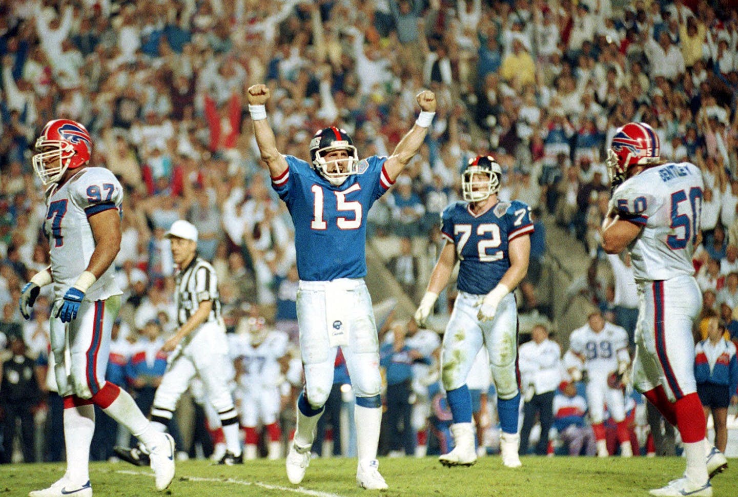 FILE -- New York Giants quarterback Jeff Hostetler celebrates a second quarter touchdown against the Buffalo Bills during Super Bowl XXV in Tampa