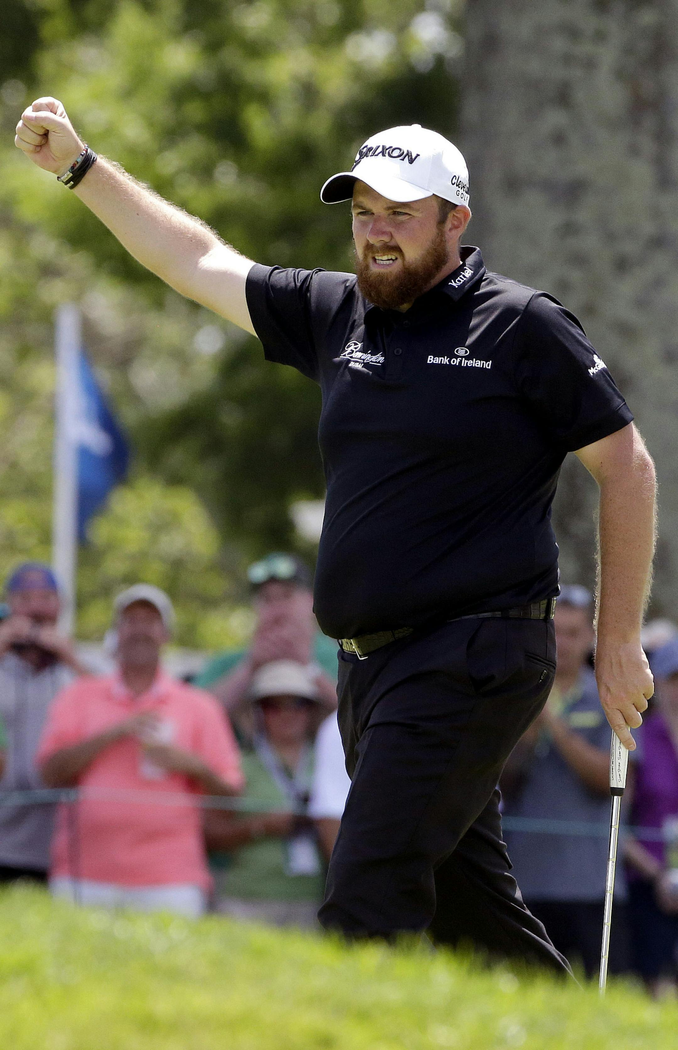 Shane Lowry, of Republic of Ireland, reacts after making a birdie on the ninth hole during the rain delayed second round of the U.S. Open golf championship at Oakmont Country Club on Saturday, June 18, 2016, in Oakmont, Pa. (AP Photo/Gene J. Puskar)