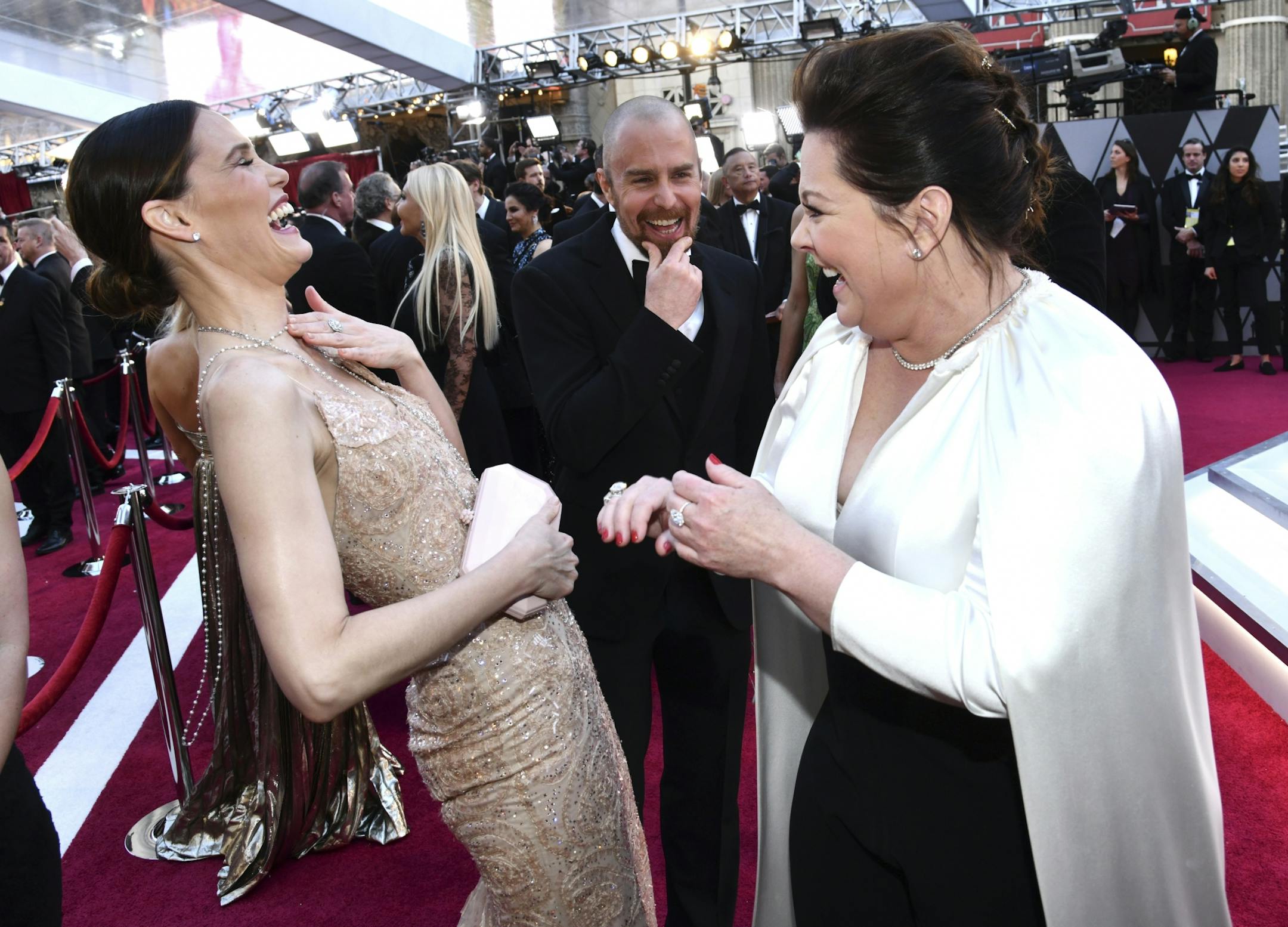 Leslie Bibb, from left, Sam Rockwell and Melissa McCarthy arrive at the Oscars on Sunday, Feb. 24, 2019, at the Dolby Theatre in Los Angeles.
