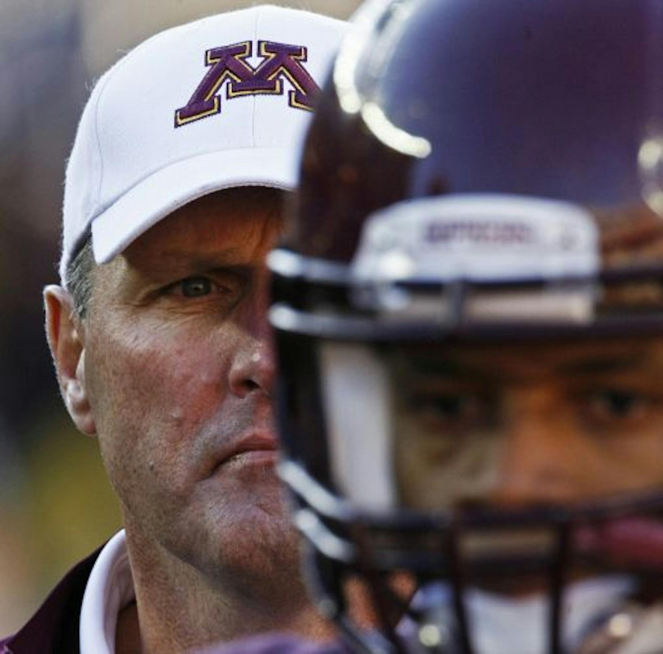 It was a long game for Gophers head coach Tim Brewster as he watched from the sideline.