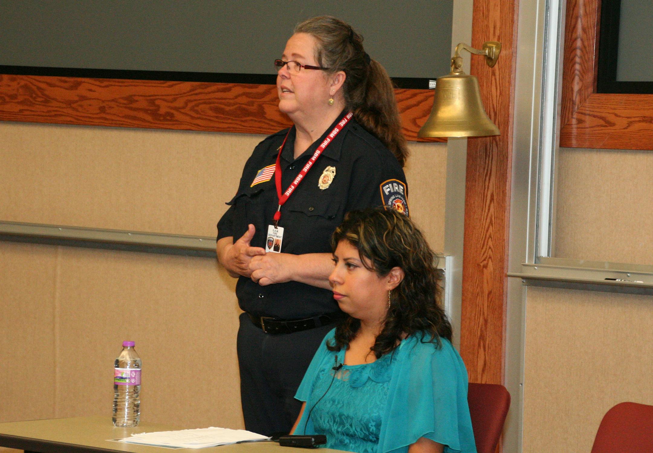 Becky Booker, Spring Lake Park-Blaine-Mounds View Fire Department, moderates a panel of immigrants and refugees, including Alejandra Zavala, from Mexico, at a recent staff training on cultural diversity. Anoka County Children and Family Council