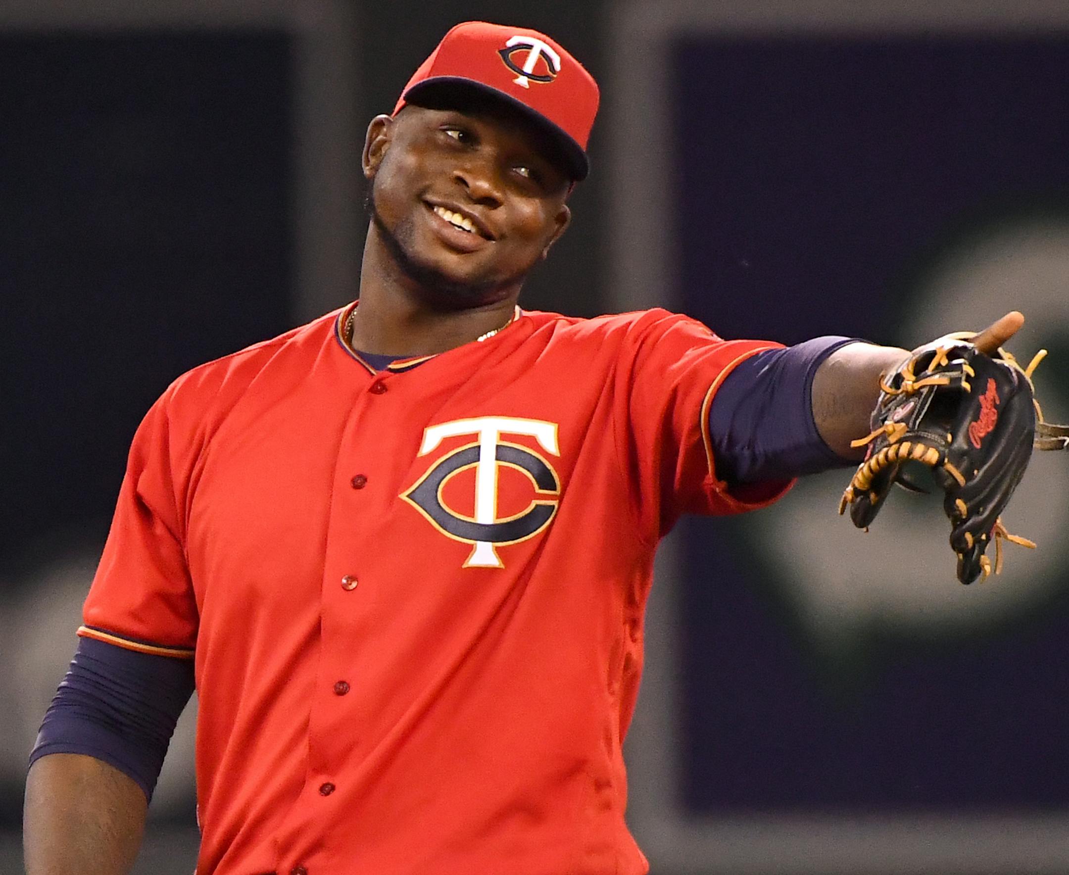 Minnesota Twins third baseman Miguel Sano (22) gestured to second baseman Brian Dozier (2) just before the start of the 10th inning Friday against the Texas Rangers. ] (AARON LAVINSKY/STAR TRIBUNE) aaron.lavinsky@startribune.com The Minnesota Twins play the Texas Rangers on Friday, July 1, 2016 at Target Field in Minneapolis, Minn.