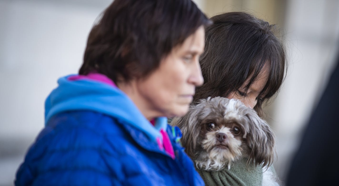 Jennifer Smith, left, and Susie Allard, aunts of Jayme Closs, stand behind the podium during the press conference. Allard holds Jayme's dog Molly. ] LEILA NAVIDI &#xef; leila.navidi@startribune.com BACKGROUND INFORMATION: Press conference held at the Barron Couty Justice Center in Barron, Wis. to update the case of missing person 13-year-old Jayme Closs on Wednesday, October 24, 2018.