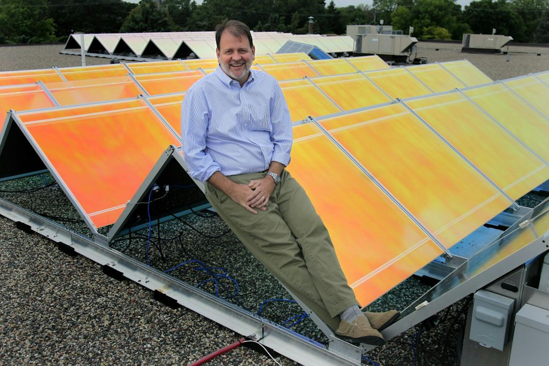 Joel Cannon, the CEO of tenKSolar, a manufacturer of solar panels, was photographed on tenKSolar's roof, Tuesday, August 2, 2012 in Bloomington, MN.