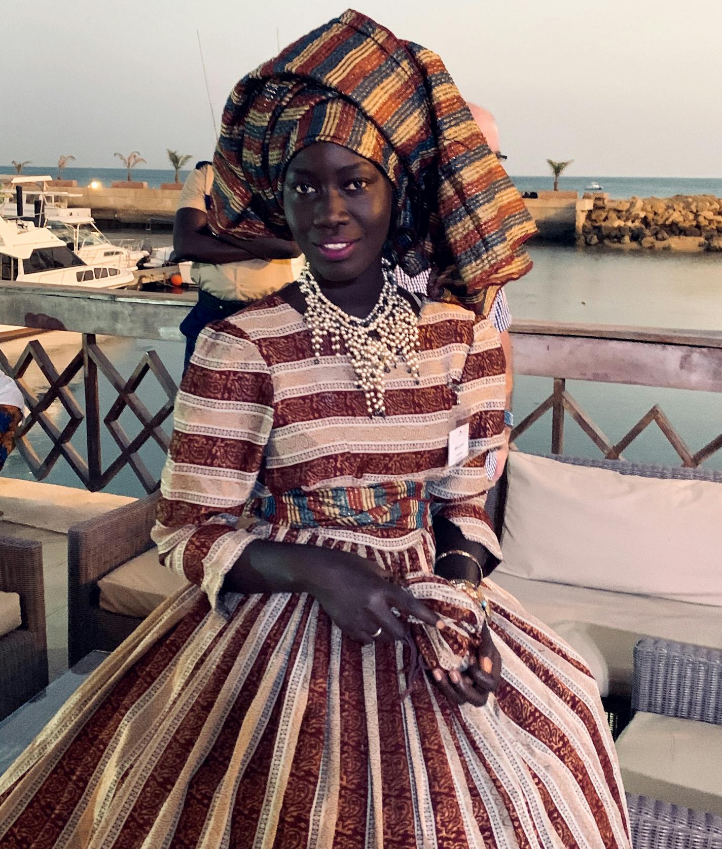 Senegal is known as the capital of Franco African fashion. This Senegalese woman wears traditional clothing made of bazin fabric. MUST CREDIT: Courtesy of Eric Martin