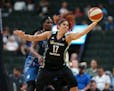 New York Liberty center Amanda Zahui B., a former Gophers player, reached for a pass while defended by Lynx center Sylvia Fowles during a game in 2017